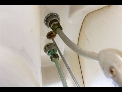 mixer tap leaking under sink|How to fix a leak running down from underneath your mixer taps